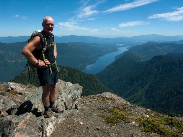 Here's Brett, with the view down the length of Sproat Lake, and Port Alberni and Mount Arrowsmith in the distance.